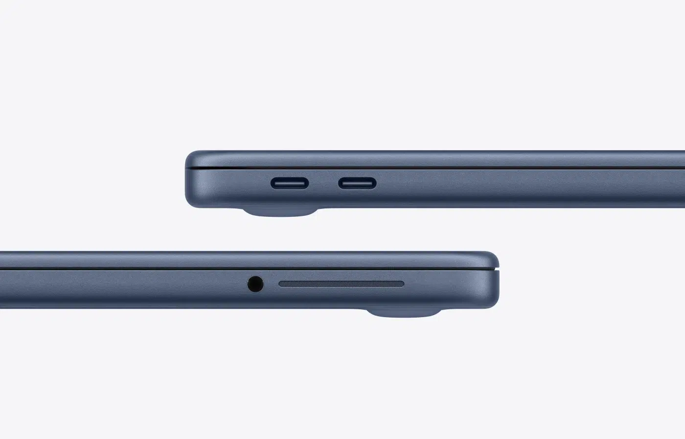 13-inch MacBook Neo, indigo (dark blue color) enclosure, lid closed, left side exterior, thin profile, 3.5mm headphone jack, speaker, two USB-C ports