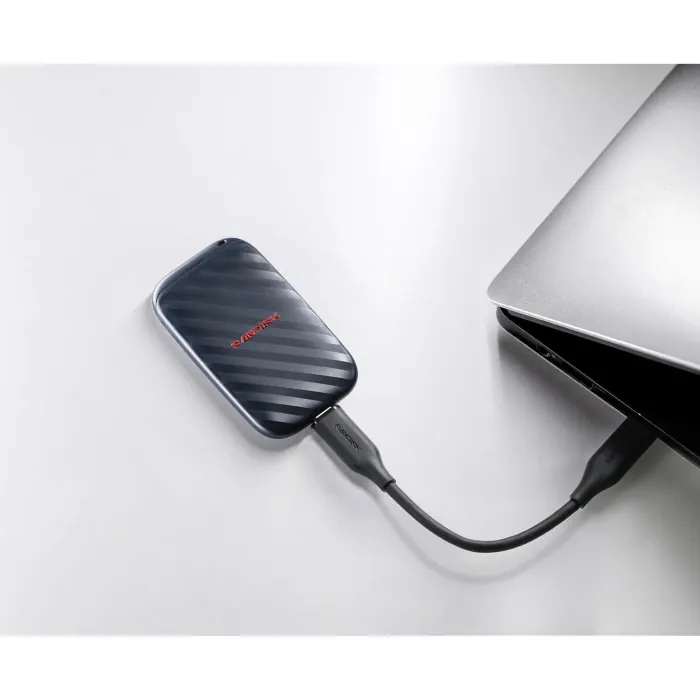 SanDisk Portable Drive in an everyday laptop workspace