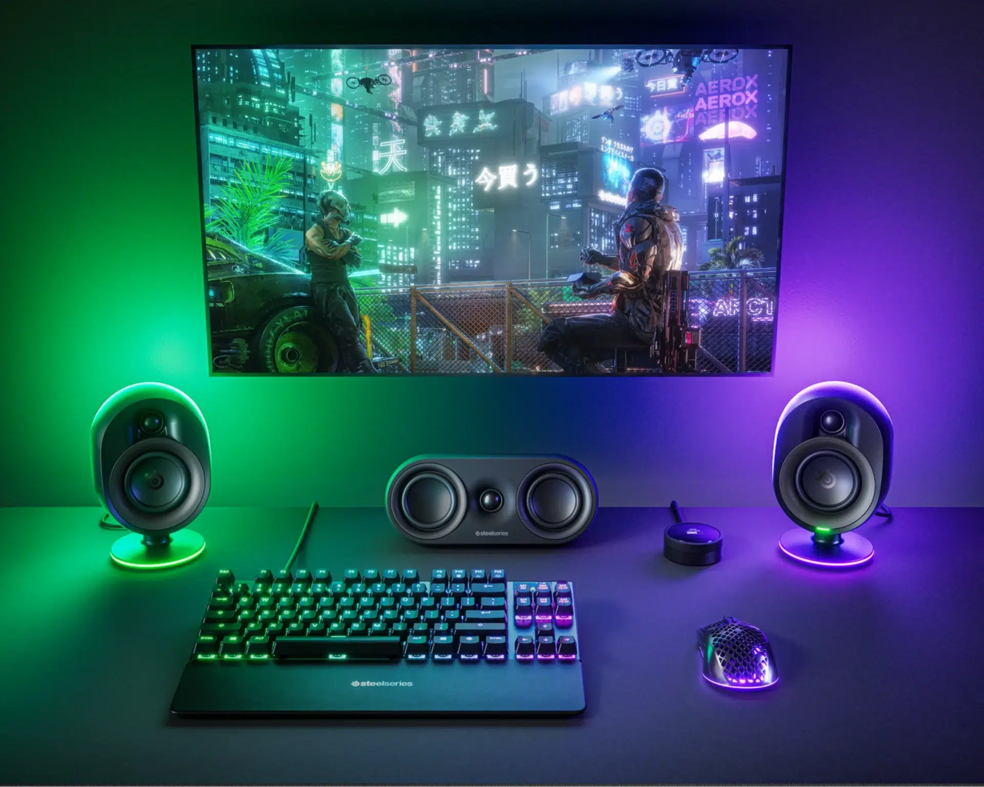SteelSeries Arena 9 front speakers and center speaker in an RGB gaming setup